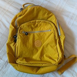 yellow kipling backpack